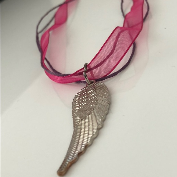 Jewelry - ÁNGEL’S WING ETCHED SILVER TONE W/FUCHSIA RIBBON